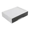 A white plastic drawer organizer with a dark gray drawer, shown from a slightly elevated angle against a white background. Podgląd zdjęcia produktu