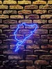 A blue neon outline of the Nurburgring Nordschleife race track is mounted on a brick wall. Náhled obrázku produktu
