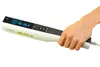 A hand holds a white medical device with a digital display and buttons. Anteprima dell’immagine prodotto