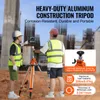 Two construction workers are using a laser level tripod on a construction site. Náhled obrázku produktu