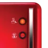A close-up view of the control panel of a red appliance, possibly a popcorn maker. Náhled obrázku produktu
