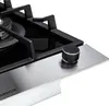 A close-up view of a gas stove burner and control knob. Náhľad obrázku produktu