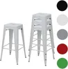 Two white metal bar stools are shown against a white background. One stool is standing alone, and the other is stacked with two more stools inside it. To the right of the stools, there are colored circles representing different color options for the stools Náhled obrázku produktu