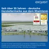 An aerial view of a large industrial warehouse complex next to a body of water, with awards and text overlays. Produktbild-Vorschau