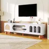 A modern living room with a TV mounted on the wall above a white TV stand. Anteprima dell’immagine prodotto