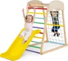 Two children playing on a wooden indoor climbing frame with a slide and climbing net. Náhled obrázku produktu