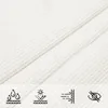 A close-up of white fabric with icons indicating product features. Voir les images du produit