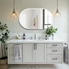 A modern bathroom vanity with a mirror, sink, faucet, and accessories. Podgląd zdjęcia produktu