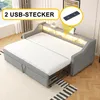 A sofa bed is shown in a room, with its mattress extended. The sofa has a built-in shelf with LED lighting and USB ports. Produktbild-Vorschau