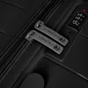 A close-up view of the zipper and combination lock of a black suitcase. Produktbild-Vorschau