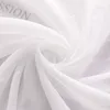 A close-up shot of white sheer fabric, likely a curtain or blind, folded and swirled. Produktbild-Vorschau