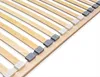 A close-up, angled view of a wooden bed slat base with plastic connectors. Náhľad obrázku produktu