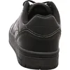 A close-up rear view of a black low-top sneaker. Produktbild-Vorschau