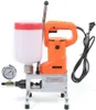 A high-pressure grouting machine with a pressure gauge and a translucent reservoir, shown against a white background. Náhled obrázku produktu