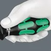 A white, stylized hand holding a screwdriver handle. Produktbild-Vorschau