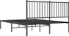 A black metal bed frame with a headboard, shown from a side-angle. Náhled obrázku produktu