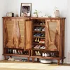 A wooden shoe cabinet with rattan doors, filled with various shoes, placed in a room setting. Anteprima dell’immagine prodotto
