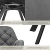 A collage of four images showcasing different aspects of a velvet armchair, including its base, fabric texture, upholstery detail, and legs. Náhled obrázku produktu