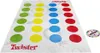 A Twister game mat and spinner are laid out on a white surface. Náhled obrázku produktu