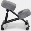 A gray and black ergonomic kneeling chair with wheels, shown from the side against a white background. Produktbild-Vorschau