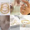 Schmuck-Adventskalender 2026, 24 Teile, Schwarz-Gold Voir les images du produit