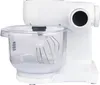 A white stand mixer with a clear bowl and whisk attachment is shown against a white background. Produktbild-Vorschau