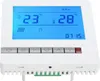 A white digital thermostat with a blue LCD screen displaying temperature and time. Voir les images du produit