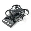 A black drone is placed on a digital scale. Produktbild-Vorschau
