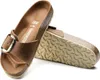 A pair of Birkenstock sandals shown from a diagonal angle against a white background. Podgląd zdjęcia produktu