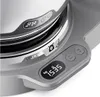 A close-up view of a digital kitchen scale, showing the display and control buttons. Voir les images du produit