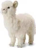 A white plush alpaca toy standing on a white background. Produktbild-Vorschau