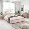 A bedroom scene with a bed, dresser, and window. Produktbild-Vorschau