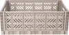 A beige folding storage box shown from the front. Produktbild-Vorschau