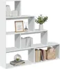 A white, multi-tiered bookshelf filled with decorative items and books. Náhled obrázku produktu