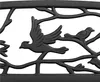 A close-up of a black metal garden bench with a decorative design of birds and branches. Produktbild-Vorschau