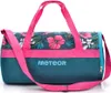 A studio shot of a duffel bag with a floral pattern. Podgląd zdjęcia produktu