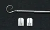A metal curtain rod and two adhesive hooks are laid out on a black background. Produktbild-Vorschau