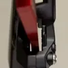 A close-up view of a bicycle brake caliper tool. Produktbild-Vorschau
