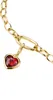 A close-up shot of a gold chain bracelet with a heart-shaped red gemstone charm. Náhled obrázku produktu