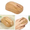 A collage of images showing a wooden computer mouse from different angles, including one with a hand using it. Produktbild-Vorschau
