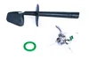 A set of kitchen appliance parts, including a spatula, a blade assembly, and a green gasket, laid out on a white background. Produktbild-Vorschau
