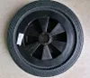 A black wheel with a rubber tire and plastic rim is shown from a top-down perspective. Produktbild-Vorschau