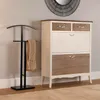 A valet stand and a multi-drawer cabinet are shown in a room. Podgląd zdjęcia produktu