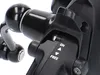 A close-up view of a fishing reel's drag system. Produktbild-Vorschau