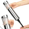 A hand holding a solar garden light with a spike. Produktbild-Vorschau