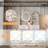 A vanity table with a lighted mirror and various cosmetic products, with a hand touching the mirror. Produktbild-Vorschau