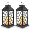 Two black lanterns with LED candles inside, set against a white background. Voir les images du produit