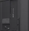A close-up view of the back panel of a television, showing various ports and labels. Produktbild-Vorschau