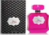 A perfume bottle and its packaging are displayed side-by-side against a white background. Náhľad obrázku produktu