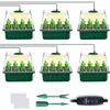 Six mini greenhouses with grow lights, along with gardening tools and markers. Produktbild-Vorschau